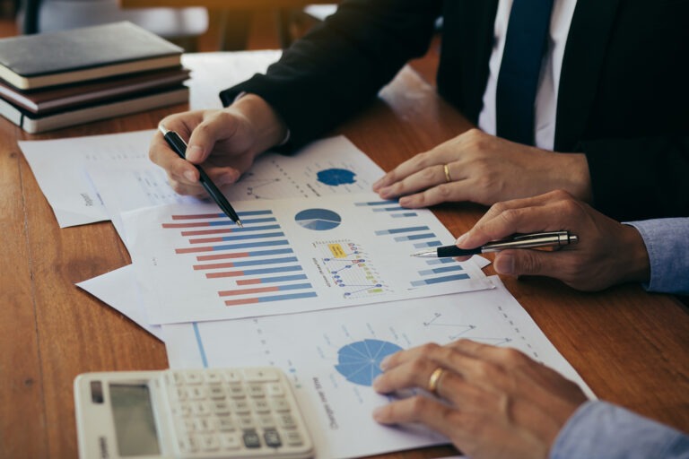 business-professionals-reviewing-charts-together-i-2026-01-06-09-00-46-utc